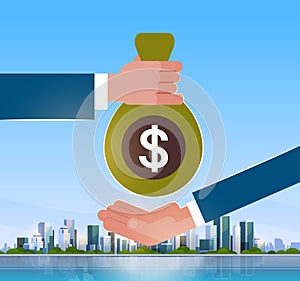 Business hand giving money to businessman salary credit loan payment over big modern city building skyscraper cityscape