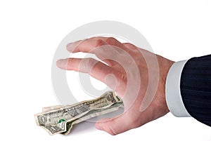 Business hand grabbing money