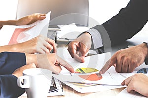 Business hand pointing at business document