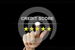 Business hand pushing credit score on screen