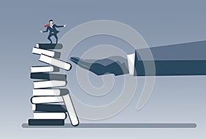 Business Hand Putting Businessman On Books Stack Strategy Success Education Intelligence Concept