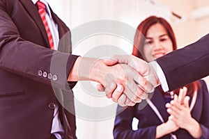 Business hand shake between executive