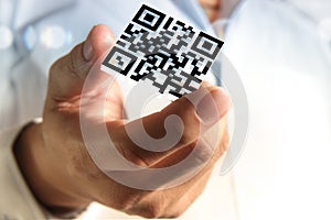 Business hand shows 3d Qr code