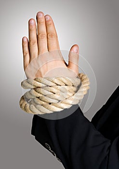 Business hands in chain, bond with rope