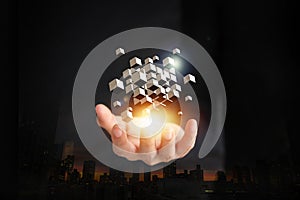 Business Hands holding glowing cubes. Innovation and creativity concept