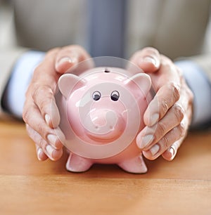 Business hands, piggy bank and savings for financial investment, budget management or income growth. Professional person