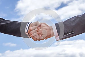 Business handshake for a closing deal