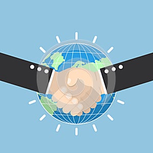 Business handshake with earth globe on background