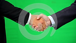 Business handshake on green screen background, partnership trust, respect sign