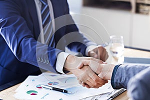 Business handshake in the office