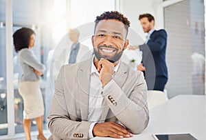 Business, happy and portrait of black man in office with confidence, pride and happiness at desk. Leadership