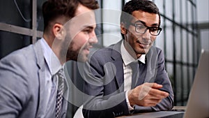 Business Having Meeting Around Table In Modern Office