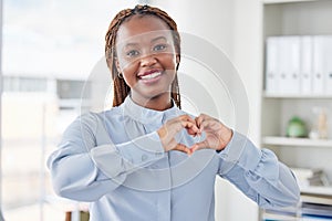 Business, heart hands or portrait of black woman with love emoji for care, kindness or like review in office. Smile