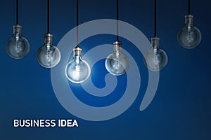 Business idea , Creativity innovation illuminated light bulb row dim ones concept solution