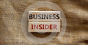 Business insider symbol. Wooden blocks with words `business insider`. Beautiful canvas background. Business insider concept. Cop