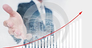 Business investor extending hand, showing increasing financial graph. Business growth and investment