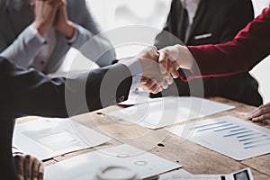 Business investor group handshake, Two businessmen are agreeing on business together and shaking hands after a successful