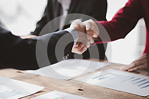 Business investor group handshake, Two businessmen are agreeing on business together and shaking hands after a successful