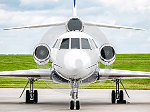 Business Jet Front with grass and sky