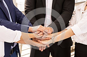 Business join hand success for dealing,Team work to achieve goals,Hand coordination photo