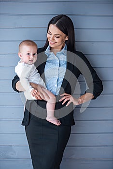 Business lady with her baby