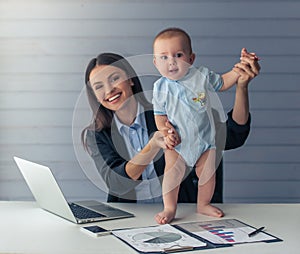 Business lady with her baby