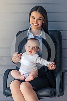 Business lady with her baby