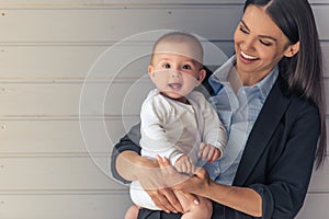 Business lady with her baby