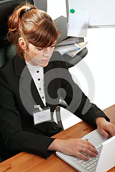 Business lady with a laptop