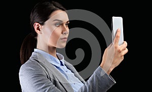 Business Lady Using Smartphone Identifying Person Standing On Black Background