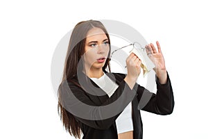 A business lady is wiping her glasses. Isolated on white background