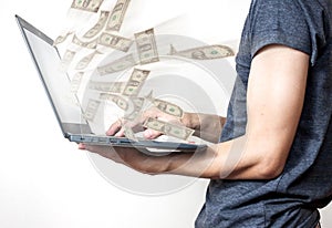 Business a laptop online business making money dollar bills photo