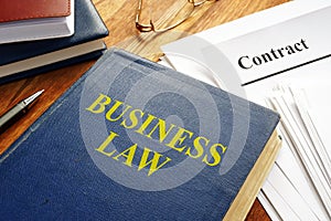 Business law book and corporate contract