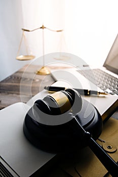 Business and lawyers discussing contract papers with brass scale on desk in office. Law, legal services, advice, justice and law