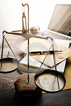 Business and lawyers discussing contract papers with brass scale on desk in office. Law, legal services, advice, justice and law