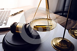 Business and lawyers discussing contract papers with brass scale on desk in office. Law, legal services, advice, justice and law