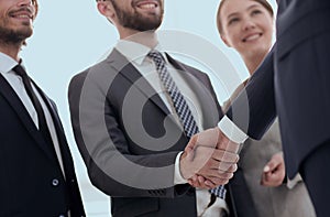 Business leader shaking hands with the investor