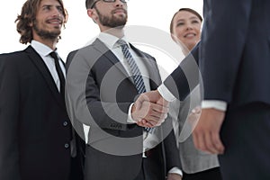 Business leader shaking hands with the investor