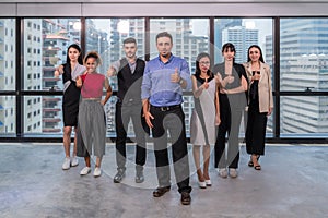 Business leaders with employees group showing thumbs up looking at camera, happy professional multicultural office team people