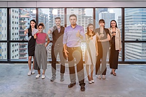 Business leaders with employees group showing thumbs up looking at camera, happy professional multicultural office team people