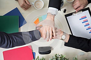 Business leaders joining hands