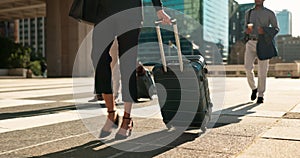 Business, legs and luggage for travel in city with corporate people walking to hotel, airport or business opportunity