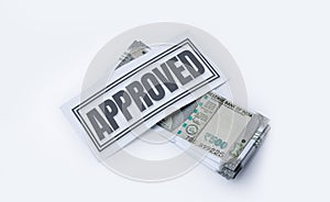 Business Loan Approved Concept: Money Isolated on White Background with Approval Stamp in the Middle. Indian currency, 500 hundred