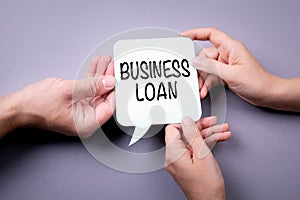 Business Loan. peech bubble on a gray background photo