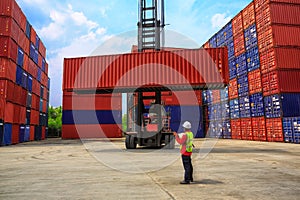 Business logistics concept, Foreman control loading Containers b