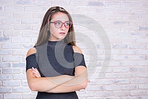 Business look of young woman with red eyeglasses