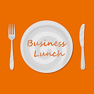 Business lunch concept. Plate with the inscription `Business Lunch` on an orange background