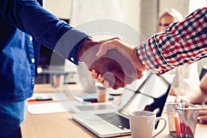 Business male partnership handshake concept.Photo two mans handshaking process.Successful deal after great meeting.