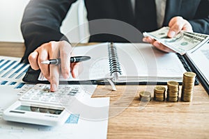 Business man Accounting Calculating Cost Economic budget investment and saving concept