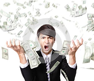 Business man anger shouting with money rain